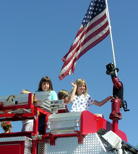 Riding the Fire Truck. Photo by Pinedale Online.