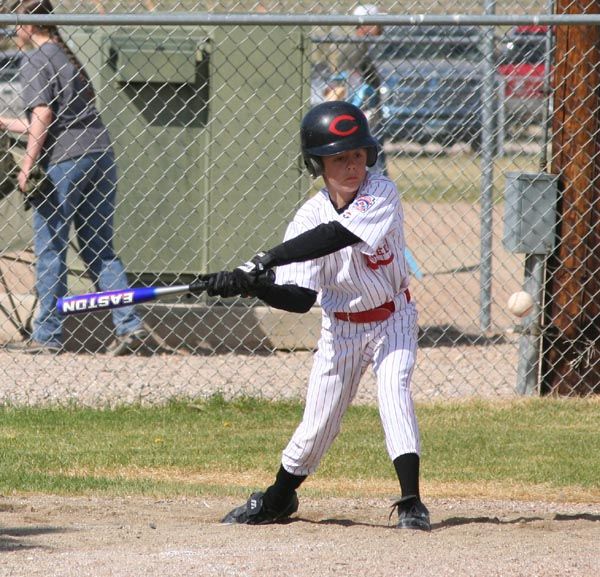 Swing batter swing. Photo by Clint Gilchrist, Pinedale Online.