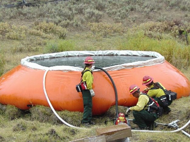 Pumping Water. Photo by U.S. Forest Service.
