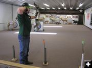 Andy McGinnis shoots. Photo by Dawn Ballou, Pinedale Online.