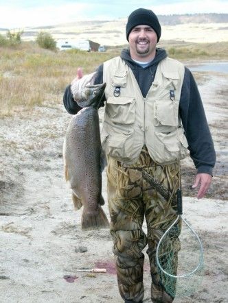 Craig and his big fish. Photo by Randy Davis.