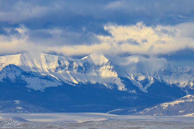 Early Light On Triple Peak. Photo by Dave Bell.