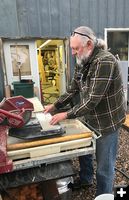 Cutting backing boards. Photo by .